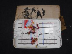 A boxed vintage Puck Master ice hockey game
