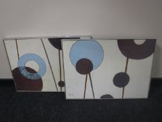 A pair of contemporary framed prints