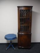 A mahogany corner display cabinet,