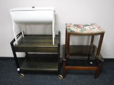 A two tier serving trolley together with a white painted sewing table,