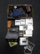 Two boxes of empty camera bags and cases,