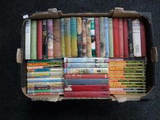 A box of mid 20th century Biggles books