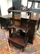 A three tier what not stand fitted a drawer,