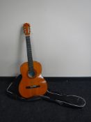A Vittoro acoustic guitar distributed by Boosey & Hawkes,