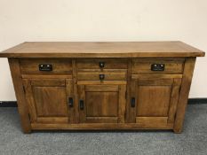 A contemporary hardwood sideboard,