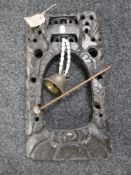 An Eastern bell with beater on a carved hardwood stand