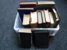 A box of three late 19th century Bibles together with a small quantity of 20th century novels and a