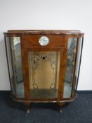A twentieth century walnut display cabinet,