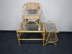 A bamboo and wicker glass top coffee table,