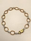 A 18ct gold diamond set bracelet,