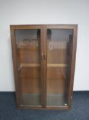 A mid 20th century teak bookcase
