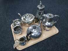 A tray containing seven pieces of plated tea ware