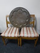A pair of antique oak dining chairs,