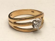 An 18ct gold solitaire diamond ring