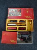 A vintage boxed Triang train set together with a box containing a Royal Mail coach and part