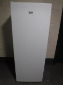 A Beko upright freezer