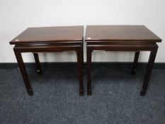 A pair of Oriental style lamp tables