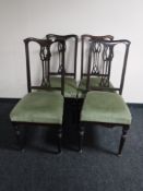 A set of four mahogany dining chairs