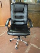 A high backed swivel office armchair