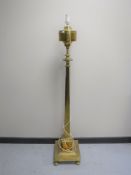 A brass column standard lamp