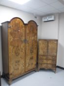 A twentieth century walnut double door wardrobe and linen chest