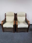 A pair of conservatory armchairs