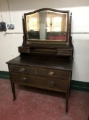 A Victorian inlaid mahogany dressing chest