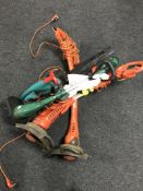 Three garden strimmers and a Bosch electric hedge trimmer
