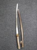 A Japanese WWII Type 95 NCO's shin gunto katana in scabbard with matching serial numbers 136429