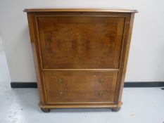 A contemporary television cabinet in a walnut finish