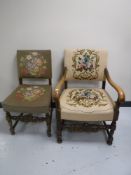 An oak tapestry upholstered armchair and a tapestry upholstered dining chair