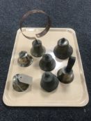 A tray of brass bells