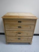 A 19th century pine four drawer chest