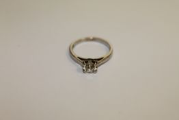 An 18ct white gold diamond solitaire ring,