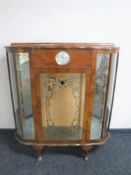 A twentieth century walnut display cabinet,