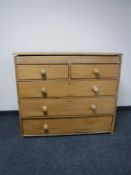 A pine five drawer chest