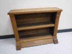 A continental oak open low bookshelf