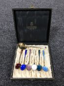 A boxed set of six Norwegian silver gilt and enamel spoons by David Anderson,