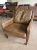 A twentieth century brown leather armchair