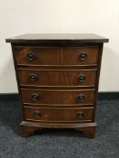 A mahogany four drawer chest