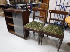 A pair of antique dining chairs on turned legs,