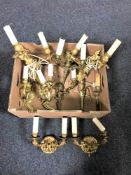 A box of gilt metal wall lights
