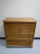 A 19th century pine four drawer chest