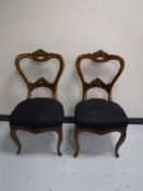 A pair of mahogany dining chairs