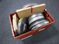 A crate of 16mm film reels