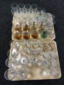 Two trays of assorted drinking glasses
