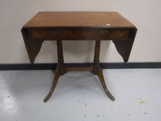 A walnut flap sided sofa table,