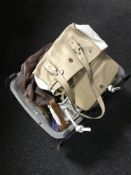 A box of assorted lady's handbags