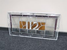 An unframed leaded stained glass window