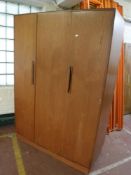 A teak G plan triple door wardrobe CONDITION REPORT: 122cm wide by 176cm high by